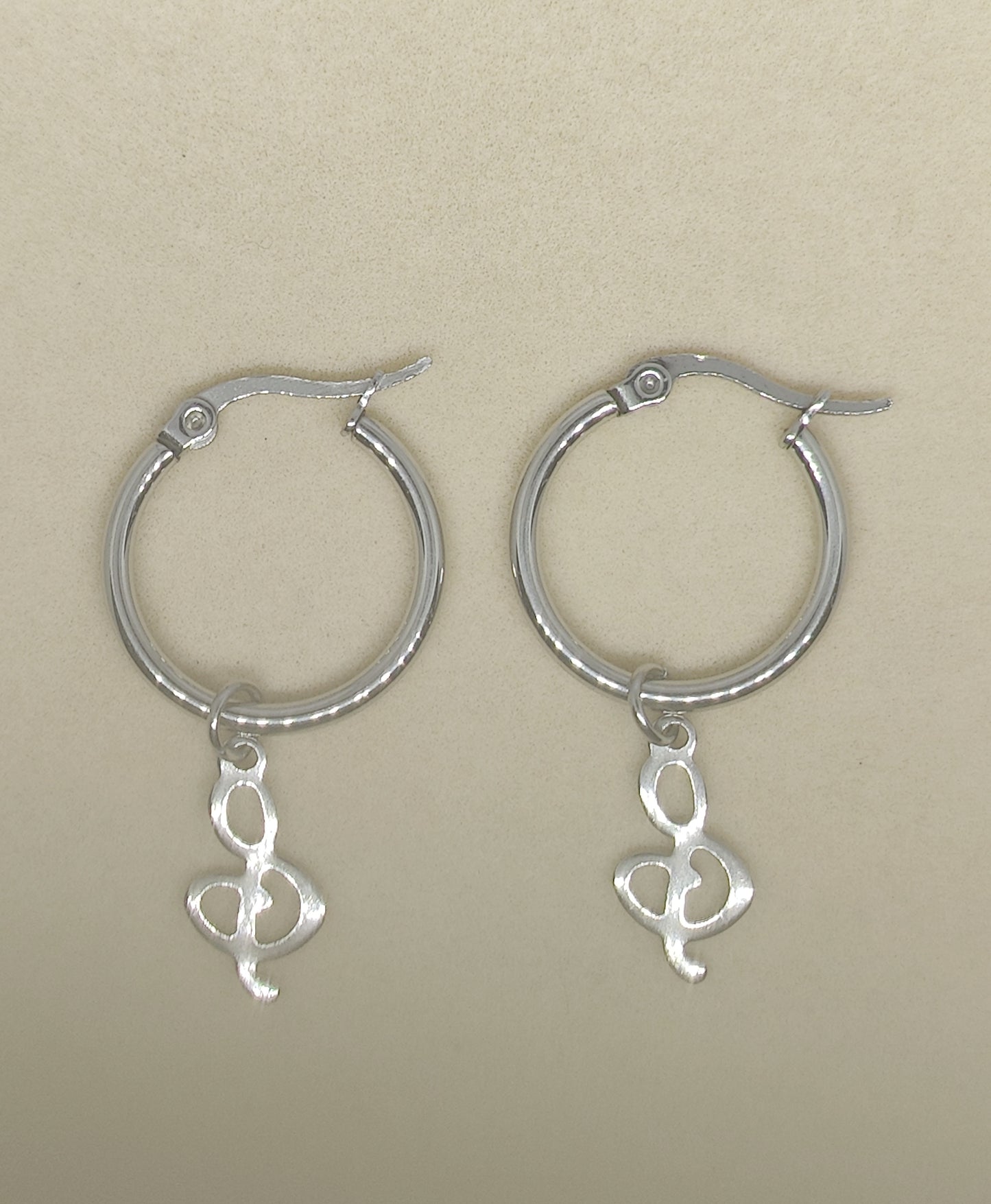 Big Round Earrings with Musical-Note-Shaped Pendant