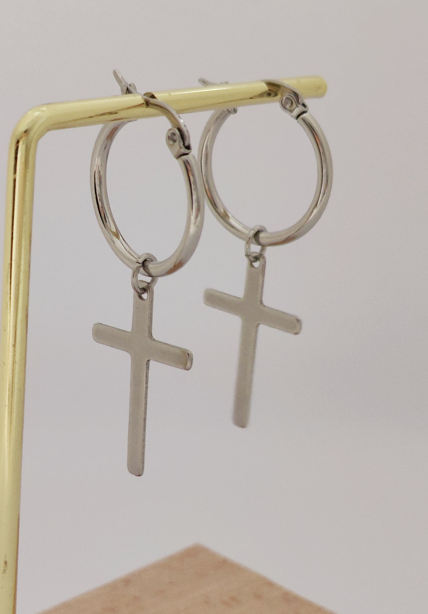 Bold Round Earrings with Delicate Cross Pendant