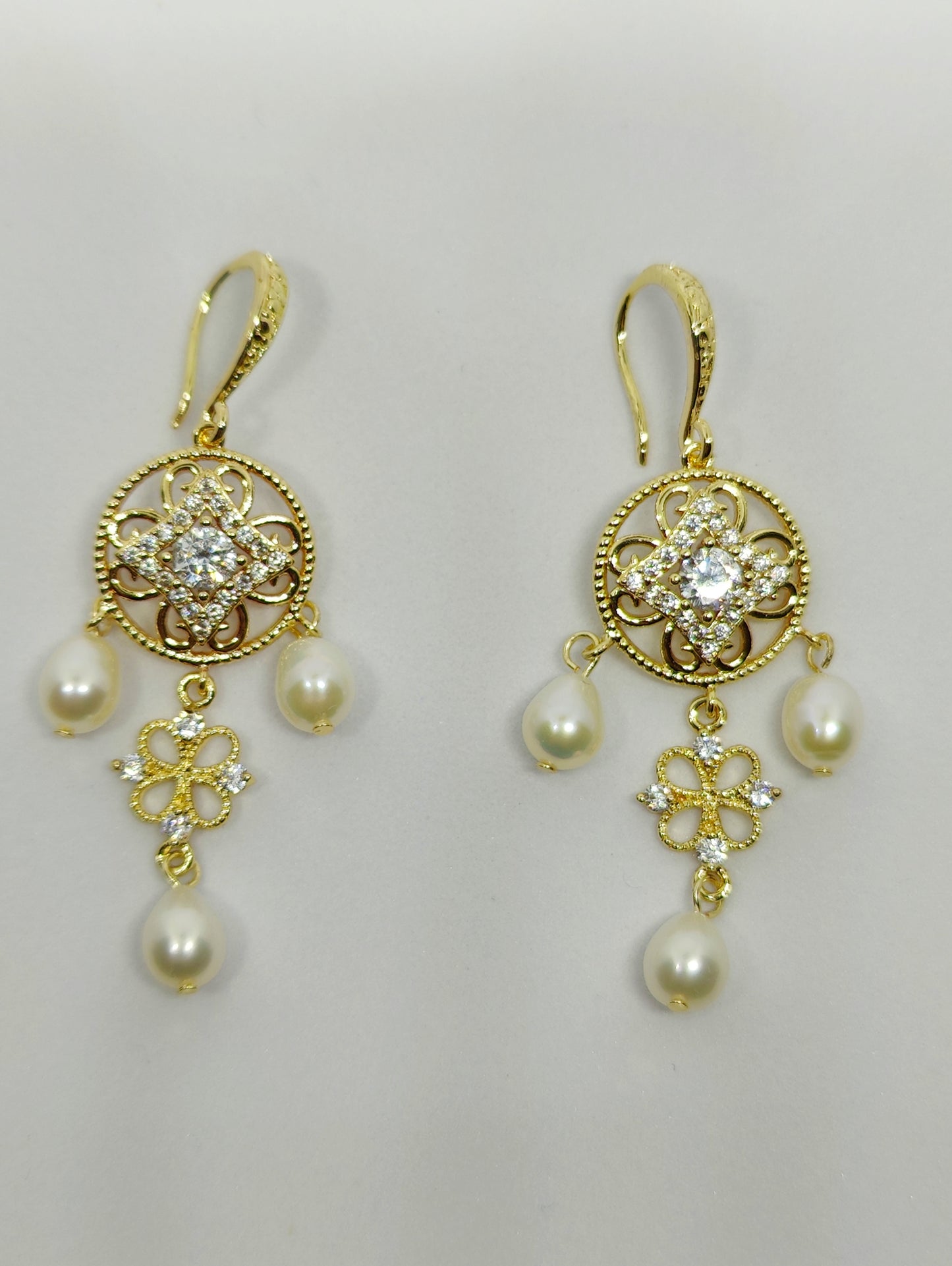 Earrings with Zircons Embedded in Round Pendant and Three Pearls